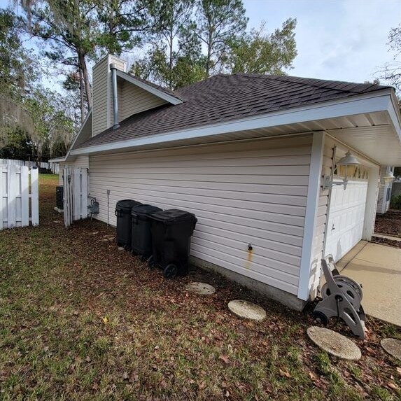 Vinyl siding after soft house washing, clean and bright